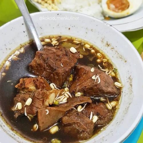 A bowl of Rawon Setan beef soup